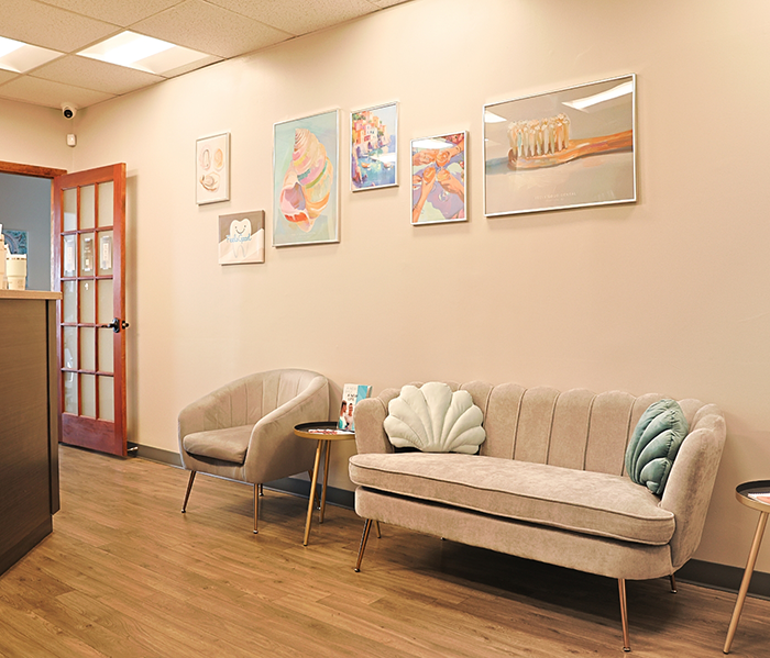 Couches and pictures on walls